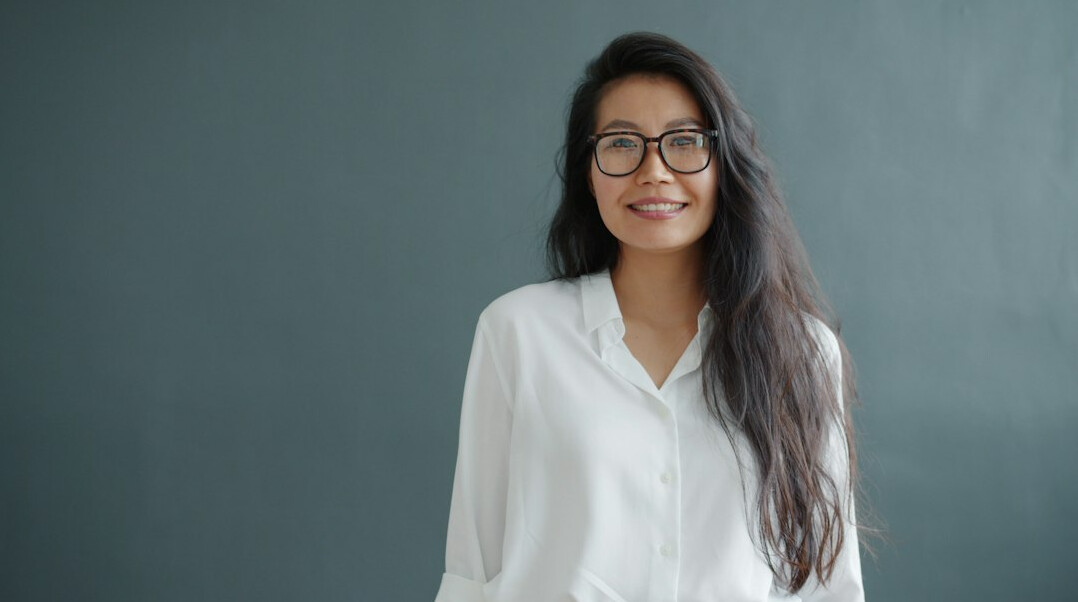 confident woman smiling at camera