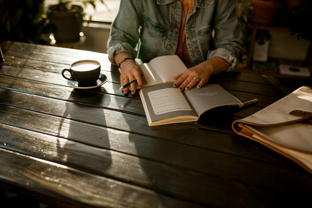 woman writing in journal
