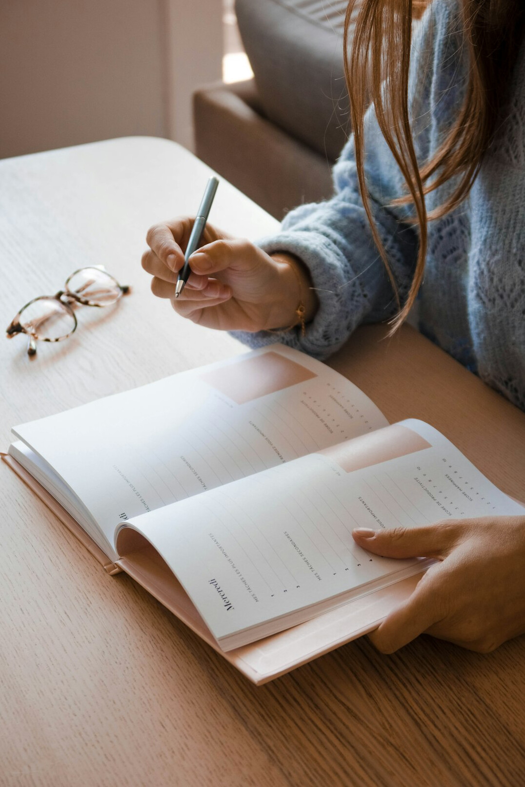 journal writing at desk