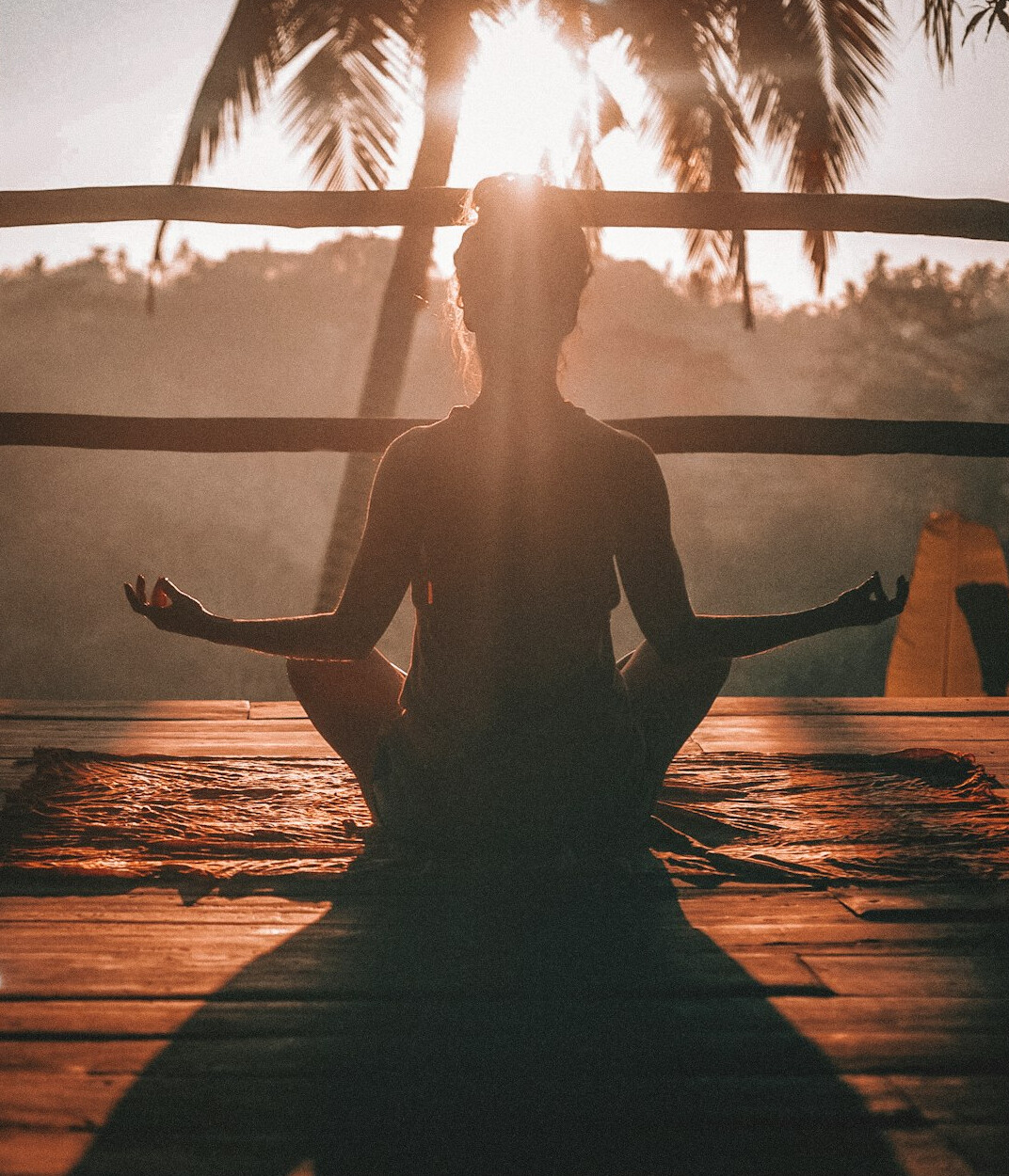 person meditating alone