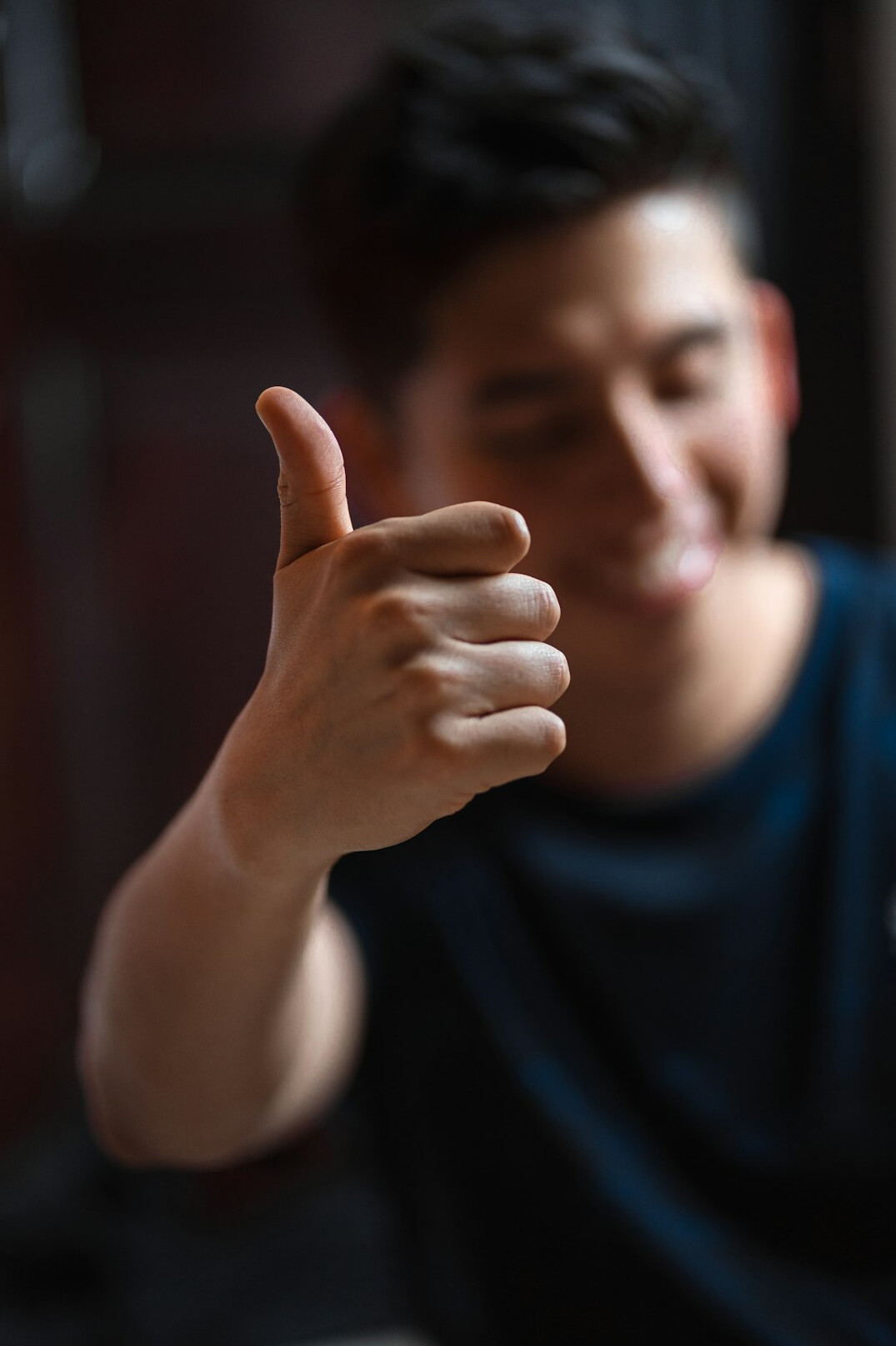 person giving thumbs up